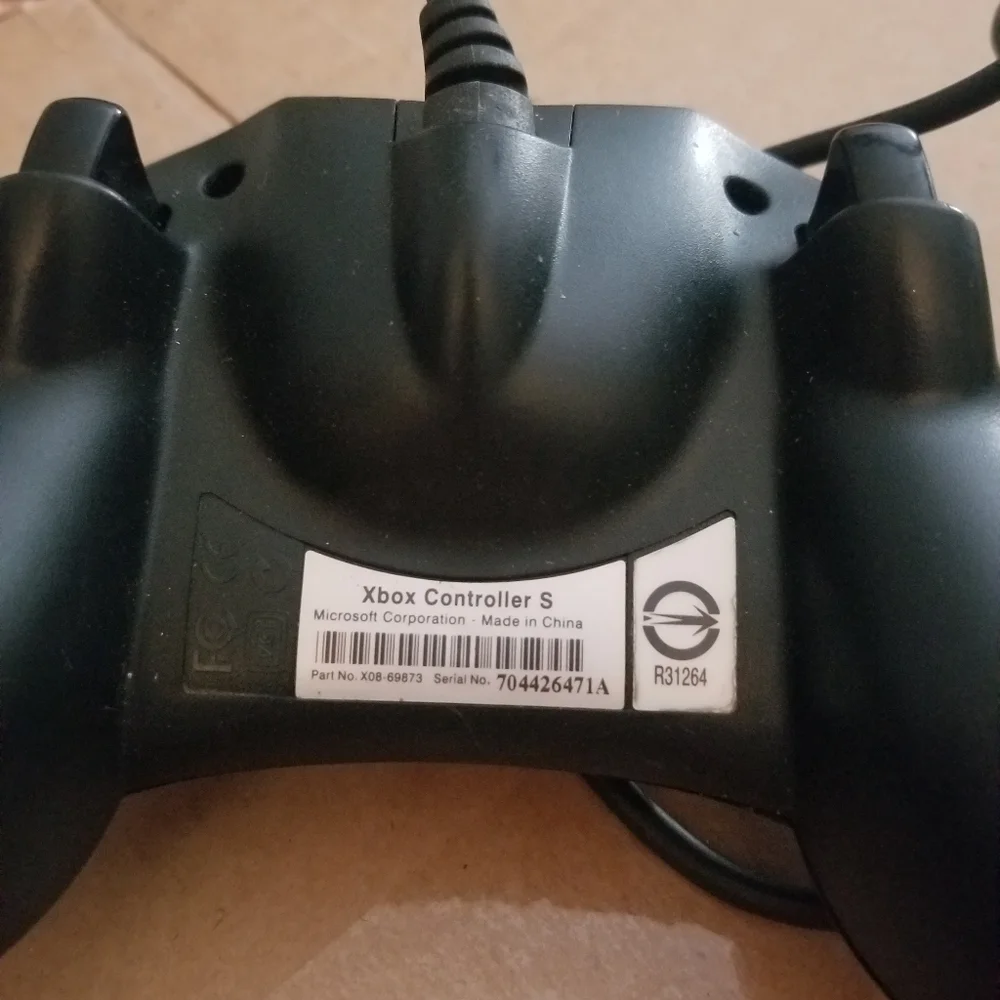 2 Controllers Wireless Xbox 360 & a wired Original X Box with Colored Buttons.